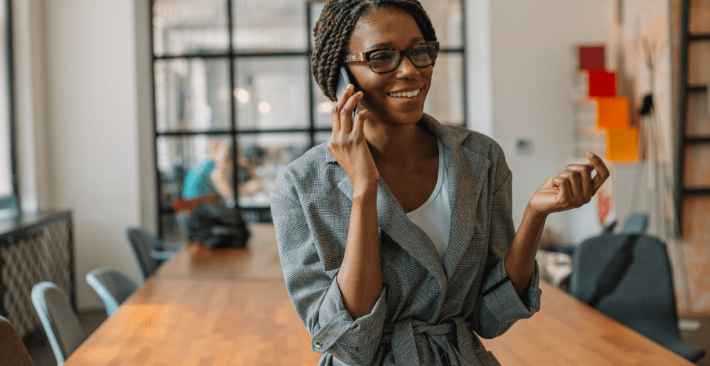 Woman making a conference call on her mobile phone