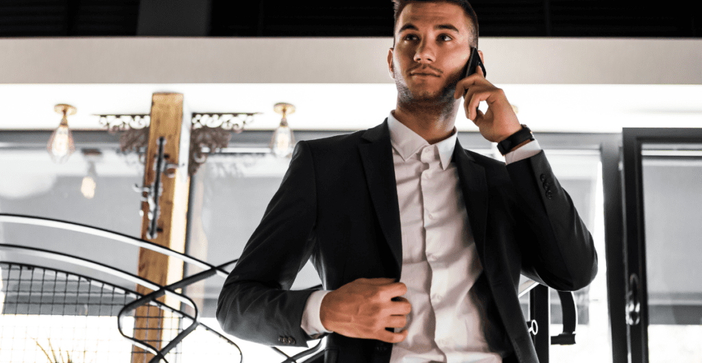 Man making a conference call on his mobile phone