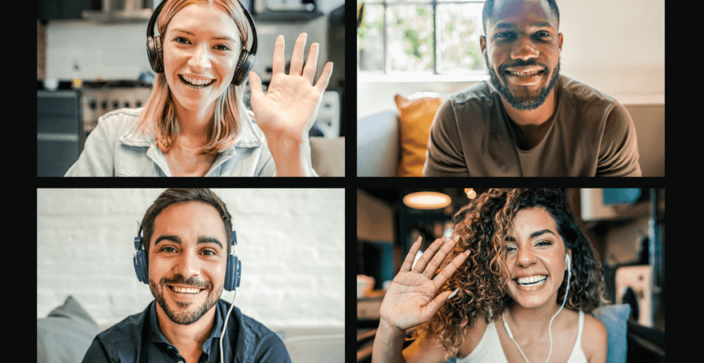 Four smiling people live on a video conference call.
